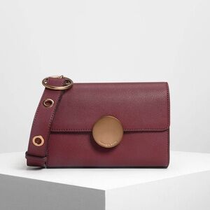 NWT Charles & Keith Burgundy Circular Push Lock‎ Crossbody Bag